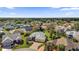 Aerial view of a single-Gathering home in a quiet residential neighborhood at 1916 Antonia Pl, The Villages, FL 32159