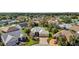 Aerial view of house and surrounding neighborhood at 1916 Antonia Pl, The Villages, FL 32159