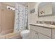 Clean bathroom with tub, shower, and updated vanity at 1916 Antonia Pl, The Villages, FL 32159