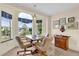 Charming breakfast nook with a window seat and built-in cabinetry at 1916 Antonia Pl, The Villages, FL 32159