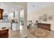 Open concept kitchen and dining area with ample natural light at 1916 Antonia Pl, The Villages, FL 32159