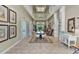 Elegant community lobby with high ceilings, comfortable seating, and tasteful artwork at 2022 Wallingford Loop, Mount Dora, FL 32757