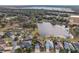 Aerial view of a beautiful home community by the lake at 2054 Vision Ct, The Villages, FL 32163