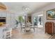 Kitchen nook with table and chairs, and view of patio at 2054 Vision Ct, The Villages, FL 32163