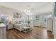 Spacious main bedroom with light wood floors and white furniture at 2054 Vision Ct, The Villages, FL 32163