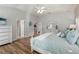 Main bedroom with access to bathroom and sitting area at 2054 Vision Ct, The Villages, FL 32163