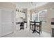 Kitchen breakfast area with table and chairs, near a window at 2202 Blackville Dr, The Villages, FL 32162