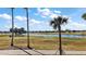 Stunning view of the golf course and lake from the property at 2202 Blackville Dr, The Villages, FL 32162