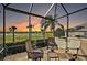 Relaxing screened porch overlooking the golf course at 2202 Blackville Dr, The Villages, FL 32162