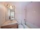 Bathroom with pink tile and a bathtub at 2355 Lakeview Ave, Clermont, FL 34711