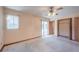 Bright bedroom with sliding glass doors to patio at 2355 Lakeview Ave, Clermont, FL 34711