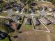 Aerial view of a residential neighborhood at 24506 Woodhill Ct, Sorrento, FL 32776