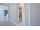 Hallway with view into a small room at 24506 Woodhill Ct, Sorrento, FL 32776