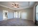 Main bedroom with multiple entry points at 24506 Woodhill Ct, Sorrento, FL 32776