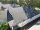 Aerial view of house showcasing a gray asphalt shingle roof at 24947 Cranes Roost Cir, Leesburg, FL 34748