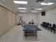 Community room with ping pong table, exercise equipment, and seating at 255 David Walker Dr # F5, Tavares, FL 32778