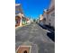 Neat row of light beige houses with terracotta roofs and lush greenery at 255 David Walker Dr # F5, Tavares, FL 32778