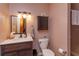 Bathroom with vanity, toilet, and shower at 2614 W Ponkan Rd, Apopka, FL 32712