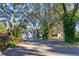 Long driveway leading to a metal building at 2614 W Ponkan Rd, Apopka, FL 32712