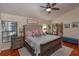 Relaxing main bedroom with a large bed and plenty of natural light at 2614 W Ponkan Rd, Apopka, FL 32712