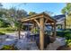 Patio with gazebo, seating, and grill at 2614 W Ponkan Rd, Apopka, FL 32712