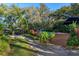 Relaxing pool area with deck and tropical plants at 2614 W Ponkan Rd, Apopka, FL 32712