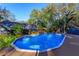 Inviting above ground pool with wooden deck at 2614 W Ponkan Rd, Apopka, FL 32712