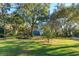 Mature trees and lush landscaping at 2614 W Ponkan Rd, Apopka, FL 32712