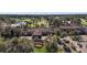 Aerial view of community clubhouse and surrounding landscape at 26148 Avenida Las Colinas # 3B, Howey In The Hills, FL 34737