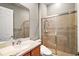 Bathroom with single vanity and large shower at 26148 Avenida Las Colinas # 3B, Howey In The Hills, FL 34737