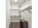 Large walk-in closet with ample shelving and drawers at 26148 Avenida Las Colinas # 3B, Howey In The Hills, FL 34737