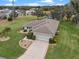 Bird's-eye view of single-story house, showcasing its layout and landscaping at 26409 Evert St, Leesburg, FL 34748