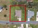 Aerial view showing house and large lot at 26409 Evert St, Leesburg, FL 34748