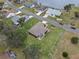 Aerial view of a single-Gathering home near a lake at 26409 Evert St, Leesburg, FL 34748