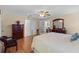 Spacious bedroom with a queen-size bed and ample natural light at 26409 Evert St, Leesburg, FL 34748