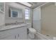 Updated bathroom with granite vanity and shower at 2715 N Dellwood Dr, Eustis, FL 32726