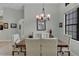 Elegant dining room featuring a large wood table and neutral decor at 27238 Stoney Brook Dr, Leesburg, FL 34748