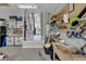 Organized garage workshop featuring workbenches and storage solutions at 27238 Stoney Brook Dr, Leesburg, FL 34748