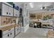 Well-organized garage workshop with ample storage and workbenches at 27238 Stoney Brook Dr, Leesburg, FL 34748