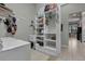 Laundry room offers built-in shelving and storage at 27238 Stoney Brook Dr, Leesburg, FL 34748