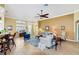 Bright living area with a view into the kitchen and dining areas at 27527 Briar Patch Pl, Leesburg, FL 34748