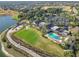 Aerial view of community features including clubhouse and pool at 276 Lawthorn St, The Villages, FL 32162