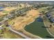 Aerial view of the golf course and surrounding community at 276 Lawthorn St, The Villages, FL 32162