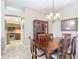 Formal dining room with wood table and chairs at 276 Lawthorn St, The Villages, FL 32162