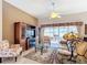 Spacious living room with a view and fireplace at 276 Lawthorn St, The Villages, FL 32162