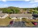 Aerial view of a three-unit building with parking at 30036 Tavares Ridge Blvd # 30036, Tavares, FL 32778