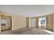 Living room with access to bathroom and front entrance at 30036 Tavares Ridge Blvd # 30036, Tavares, FL 32778