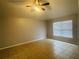 Spacious bedroom with ceiling fan and tile floors at 3236 White Blossom Ln, Clermont, FL 34711