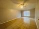 Bright bedroom with ceiling fan and tile floors at 3236 White Blossom Ln, Clermont, FL 34711