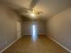 Living room with high ceilings and tile floors at 3236 White Blossom Ln, Clermont, FL 34711